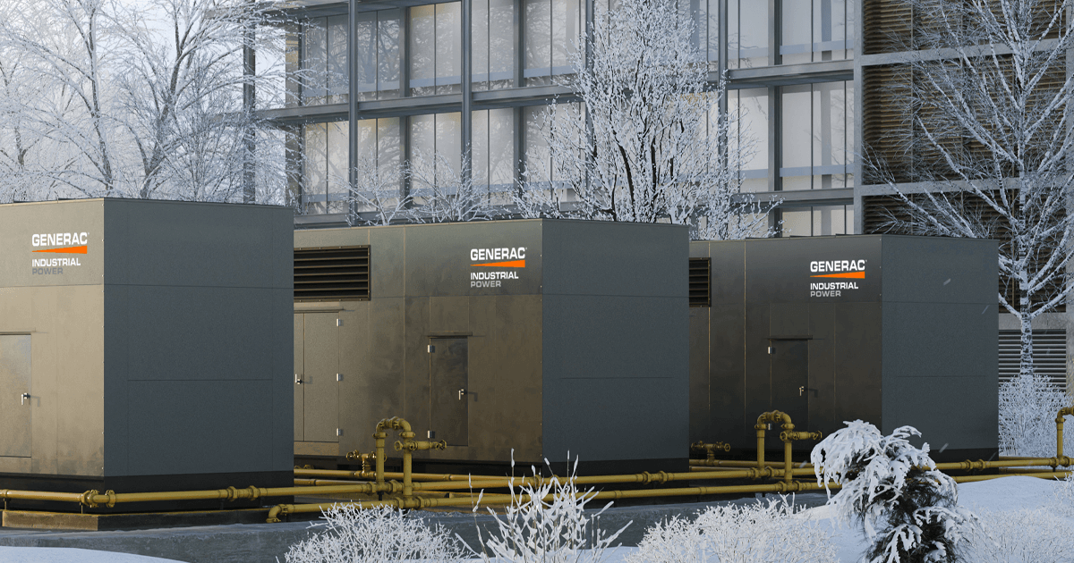 Small business industrial power transfer switches outside of large corporate building in winter.