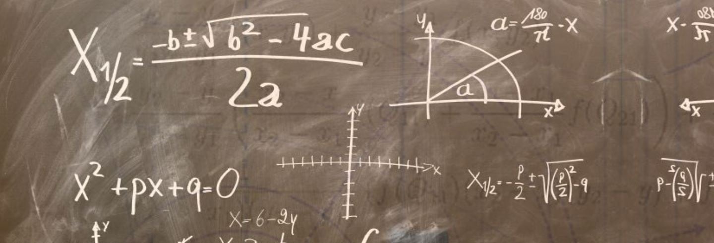 Math equations on a chalkboard