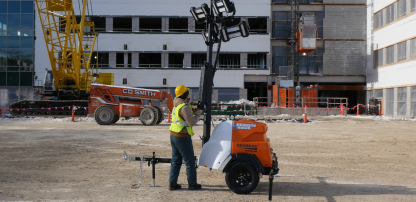 An image of a light tower outside of a construction site