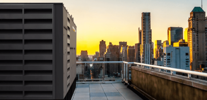 An image of a Generac generator overlooking a city skyline.