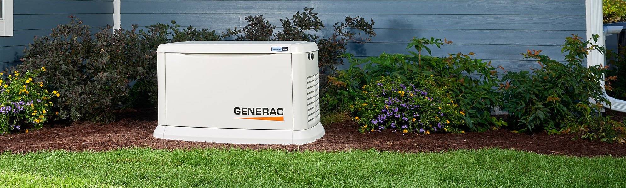 Generac Home Standby Generator in a garden outside a home.
