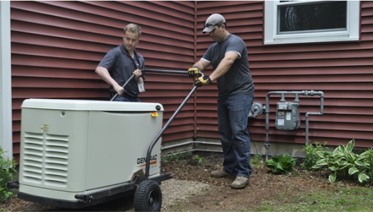 men installing generator